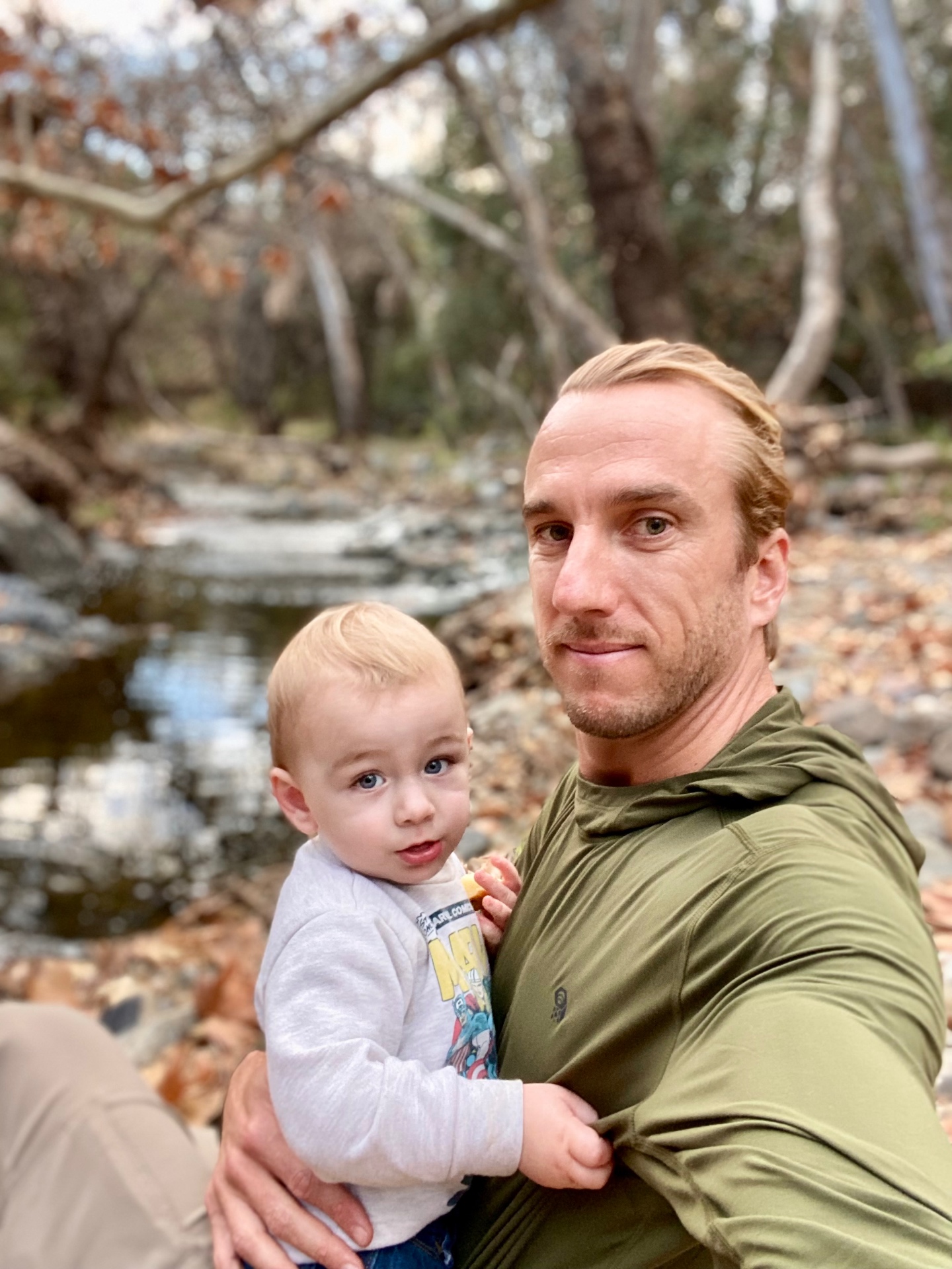 Sean with his nephew by a creek