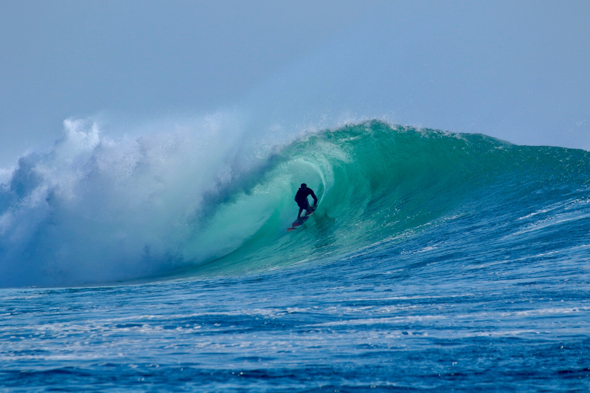 Sean surfing inside a barrel